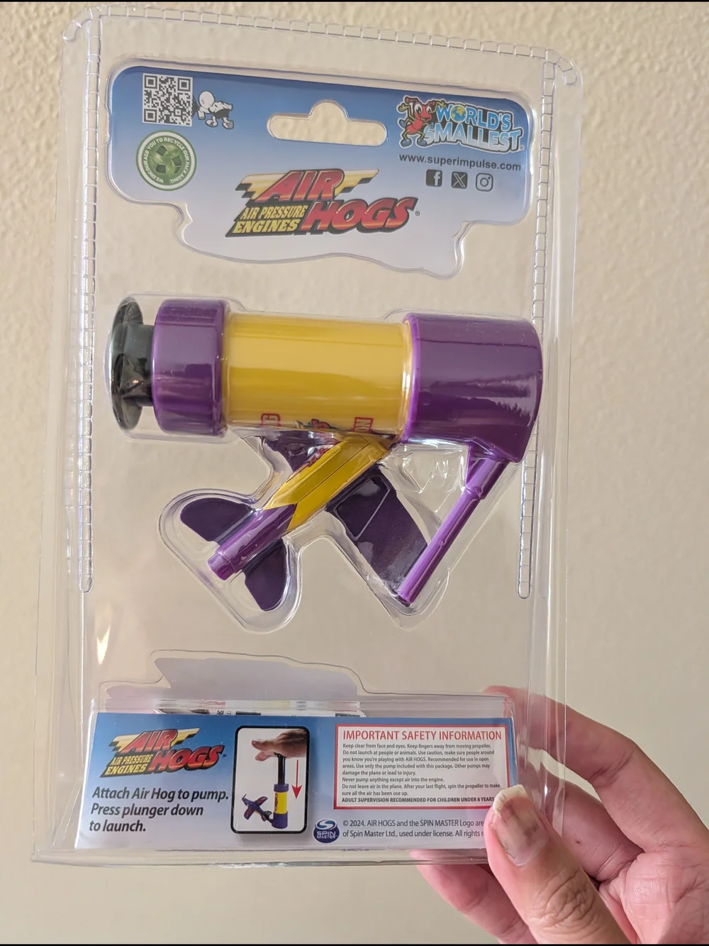 World's Smallest Air Hogs Purple Pump-Up Toy Plane